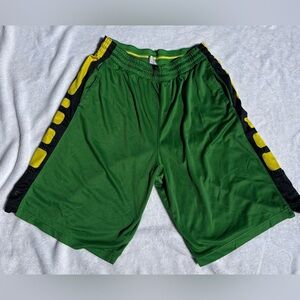 Nike Green Athletic Shorts with Yellow Accents
